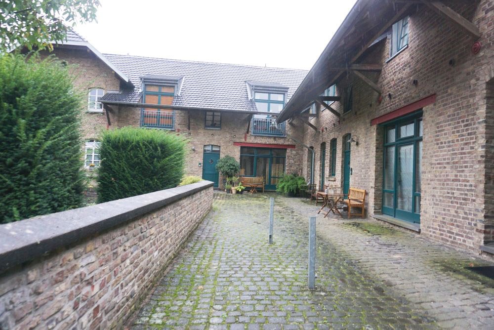 Baudenkmal: Wohngebäude einer Hofanlage aus Backstein